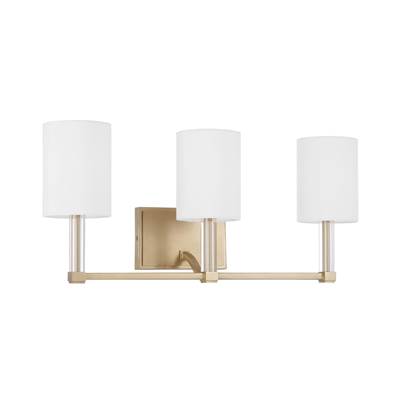 Capital Lighting Ingrid 3-Light Vanity - 24" W x 9.75" H - Clear Acrylic with White Fabric Shades in Matte Brass